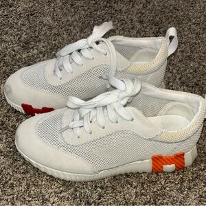 White and Orange Sneakers